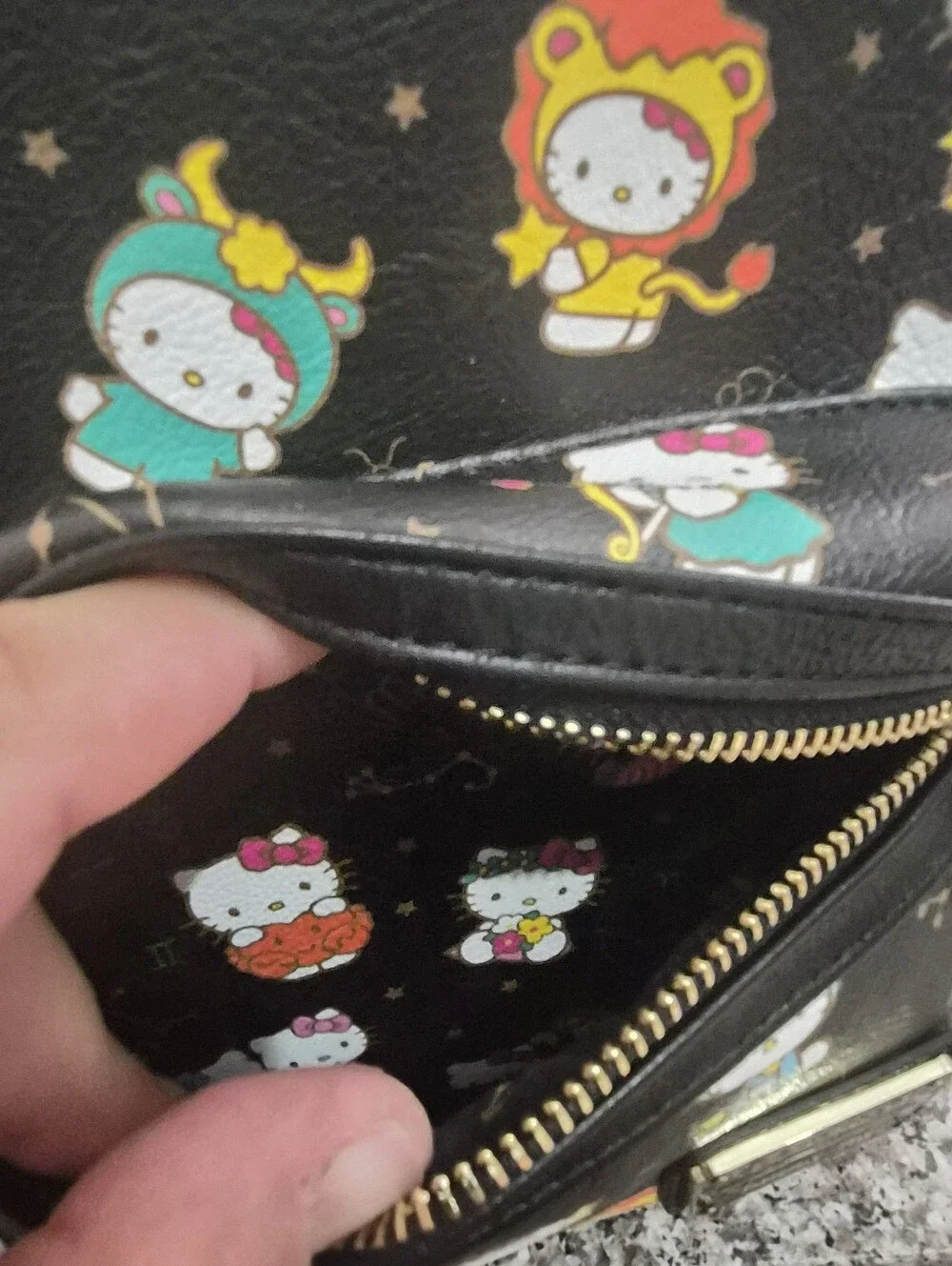 Loungefly Hello Kitty All Over Print Mini Backpack.